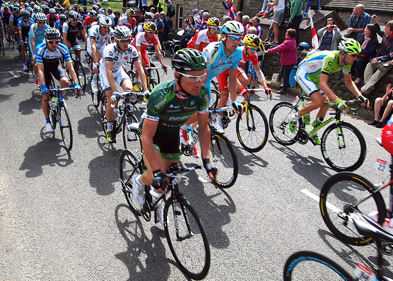 Saturday July 5th (2014) peleton flashes past align=