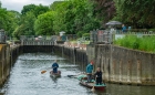 four men in two boats