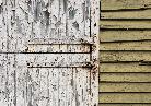 white door green barn