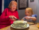 cutting the birthday carrot cake